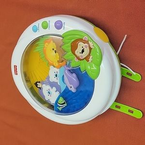 Musical animal crib entertainment center